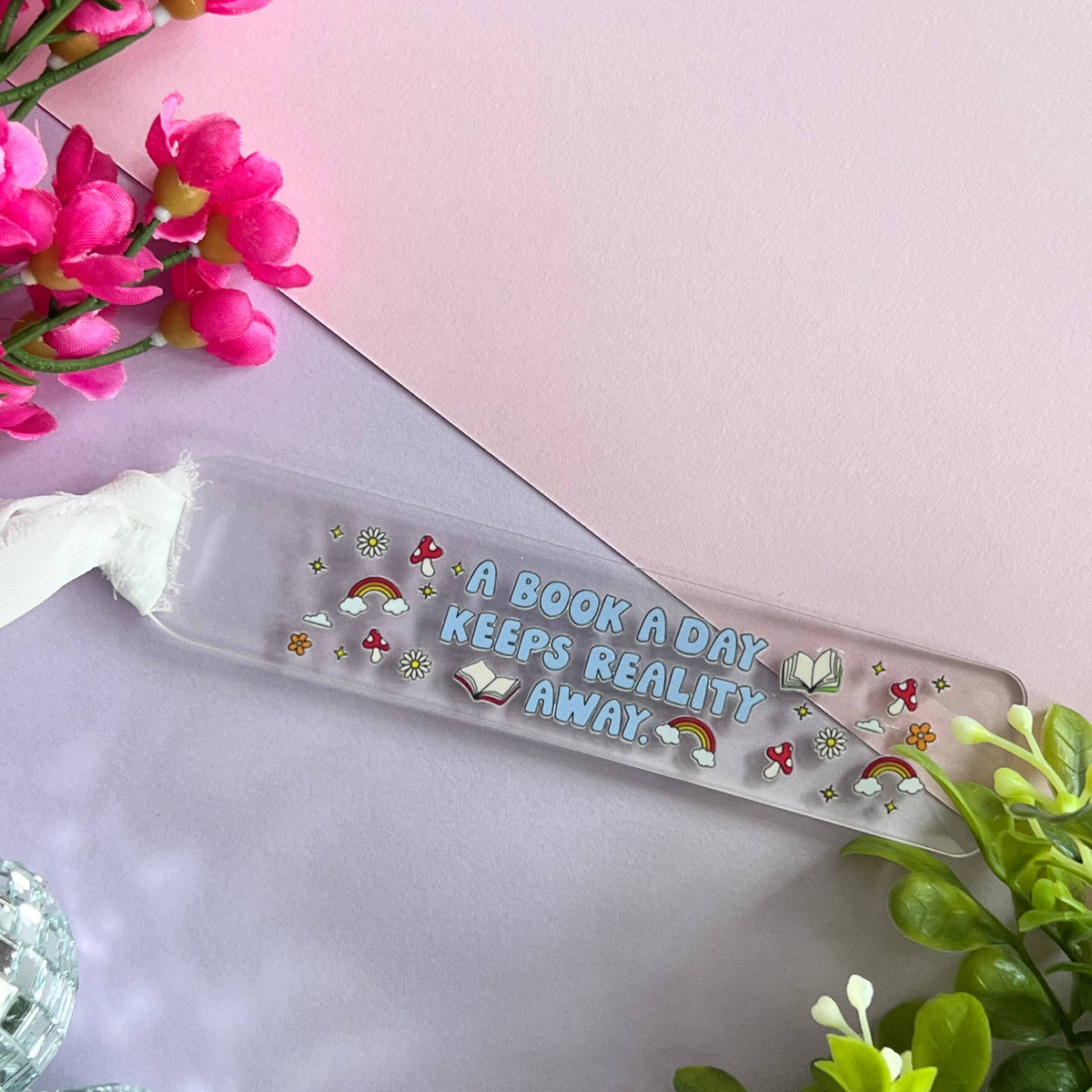 A book a day keeps reality away bookmark