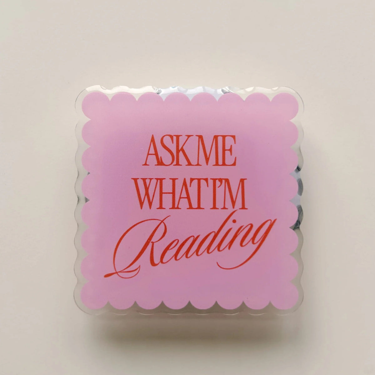 Magnetic E-Reader Grip: Ask Me What I'm Reading