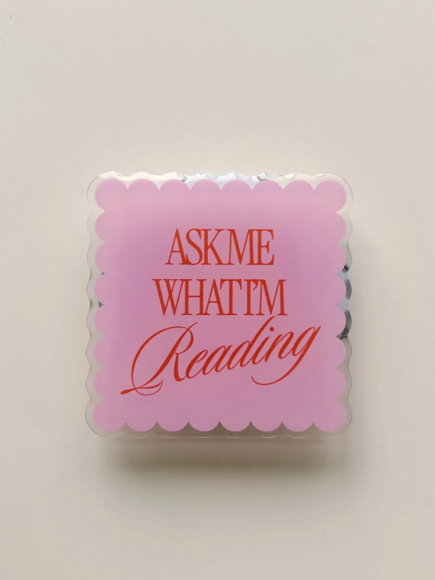 Magnetic E-Reader Grip: Ask Me What I'm Reading